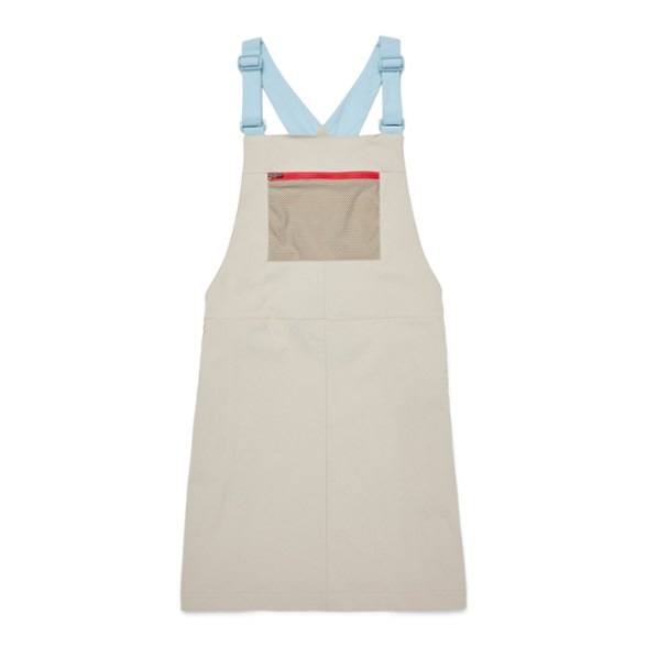 Cotopaxi Eco-Friendly Hiking Overall Dress worn on a trail, highlighting its comfort and fit.
