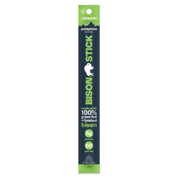 Close-up of premium grass-fed bison protein stick on a wooden board