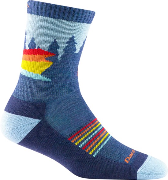 Darn Tough Kids' Merino Wool Hiking Socks displayed outdoors, showcasing durability and comfort.