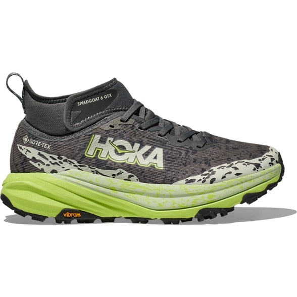 HOKA Speedgoat 6 Mid GTX hiking shoes showing side profile on rocky terrain.