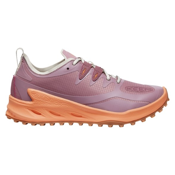 Zionic Speed women's hiking shoes on rocky terrain, showcasing high traction soles.