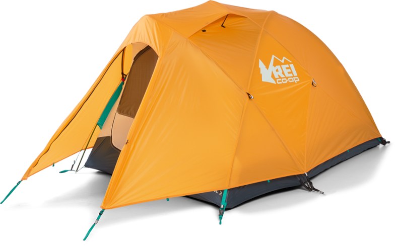 Front view of the REI Co-op Arete ASL 2 tent set up in a forest clearing, showcasing its spacious interior.