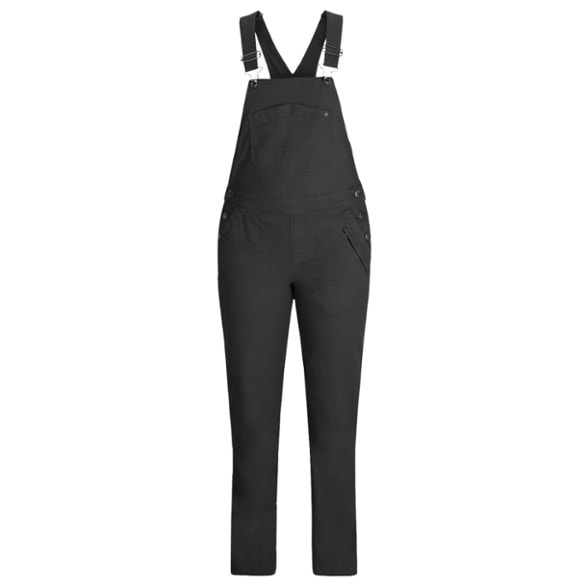 Front view of vintage-inspired women's stretch canvas overalls in a natural setting.