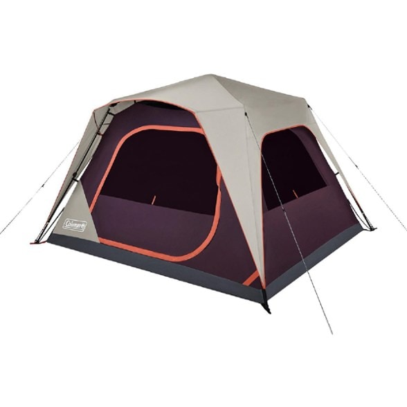 Front view of Skylodge 6-person instant tent set up in a forest, showcasing door awning and ventilation features