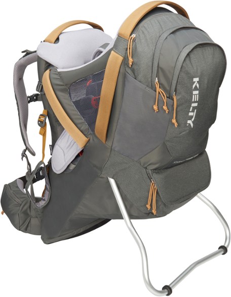 Adventure Ready Child Carrier in use during a hiking trip, showcasing its storage pockets