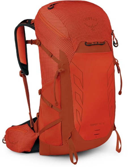 Front view of women's hiking backpack featuring top zip and helmet carrier