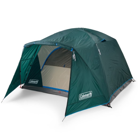 Coleman Skydome 6-person family tent setup at campsite with full-fly vestibule.