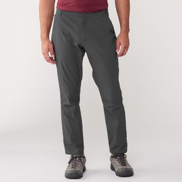 Front view of KUHL ReconTrek men's outdoor pants worn on rocky trail