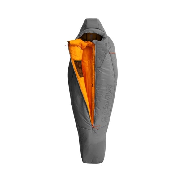 Mammut Protect Fiber Mummy Sleeping Bag in a winter camping setup, showcasing its waterproof exterior.