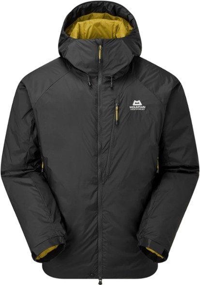 Men's packable insulated jacket worn during a ski trip, showcasing its warmth and flexibility.