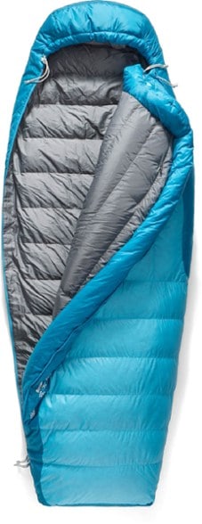 Trek 30F Women's Down Sleeping Bag displayed in a camping setting, showcasing its comfort and design.