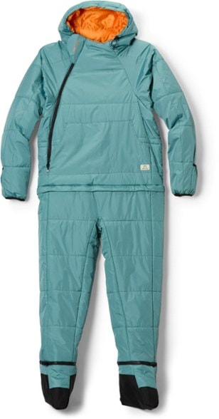 The cozy Selk'Bag SWYTCH Lite in a vibrant outdoor setting, perfect as a cozy jacket for festivals.
