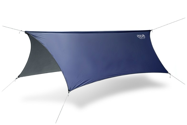 ProFly XL hammock tarp pitched over an ENO hammock in a forest, showcasing its wide rain tarp coverage