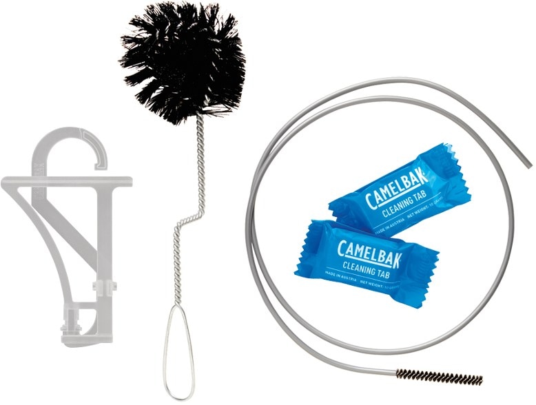 CamelBak reservoir cleaning kit with brush and cleaning tabs displayed on a table