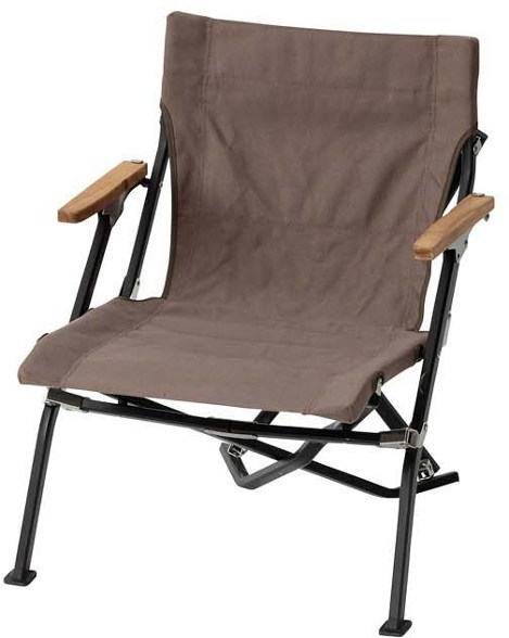 Snow Peak Elite low beach chair showing natural wood armrests and mesh storage pocket from side angle