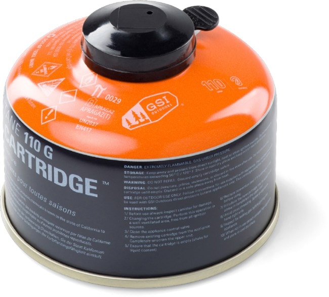 GSI Outdoors 110g isobutane fuel canister from the side, showcasing its compact design for backpacking.