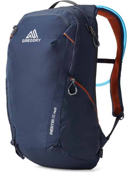 Front view of Gregory Inertia 18 H2O hydration backpack in the mountains.