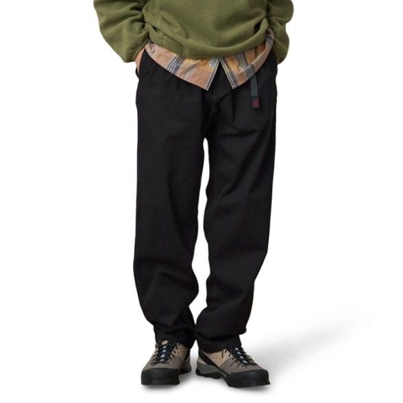 Men wearing Gramicci Freedom Flex Pants while climbing outdoors, showcasing the durability and comfort.