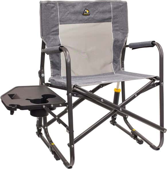 TrailBliss outdoor rocking chair with side table set up on grassy campsite, showing smooth rocking motion