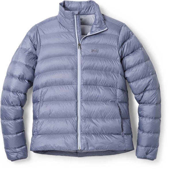 Eco-friendly women's 650 down jacket displayed outdoors in a snowy landscape, highlighting its warmth and water resistance.