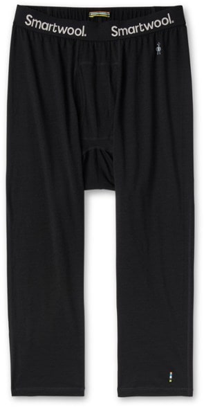 Men's All-Season Merino Base Layer Bottoms showcasing the moisture-wicking fabric in a hiking environment.