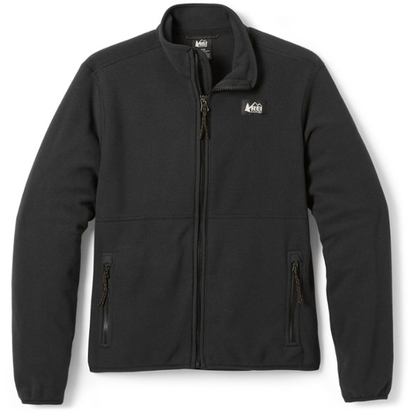 Kids wearing the eco-friendly fleece jacket while hiking in the woods.