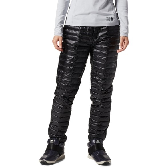 Mountain Hardwear Ghost Whisperer Women's Down Pants displayed outdoors, highlighting their warmth and sleek design.
