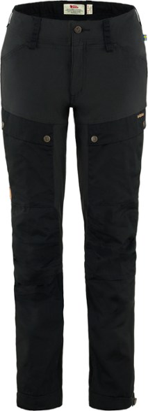 Fjallraven Keb Women's Trekking Trousers showcased in a natural outdoor setting, highlighting their durability and comfort.