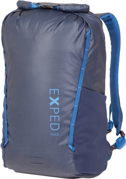 Typhoon 25 Waterproof Daypack in action during a hike, showcasing its lightweight design.