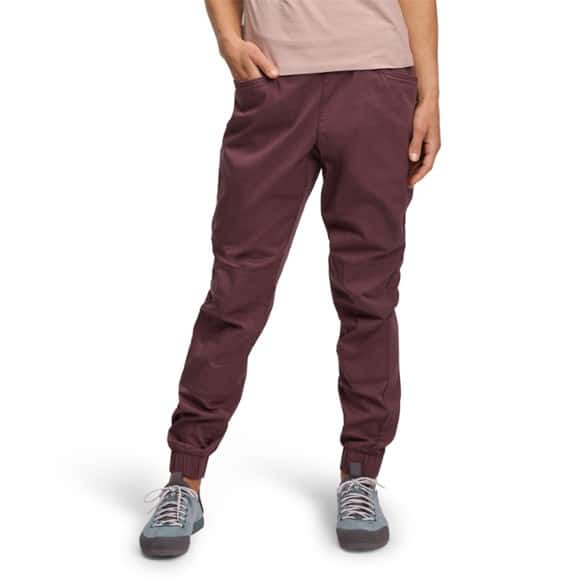 Eco-friendly women's climbing pants showcasing the elastic waistband and tapered fit.