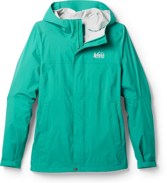 TrailBlazer Women's Waterproof Jacket in action on a hiking trail, showcasing its windproof design.