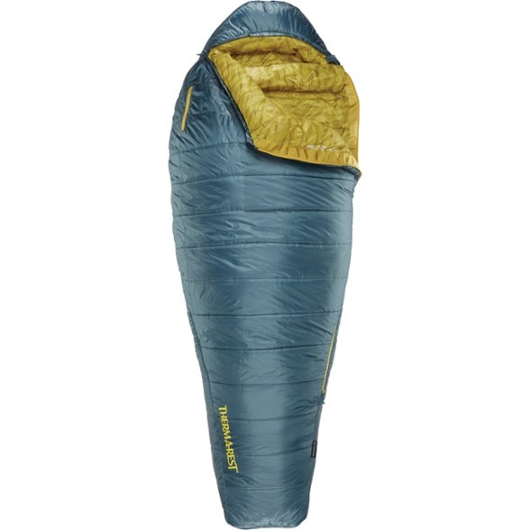 Therm-a-Rest Saros 20°F sleeping bag laid out in a campsite setting