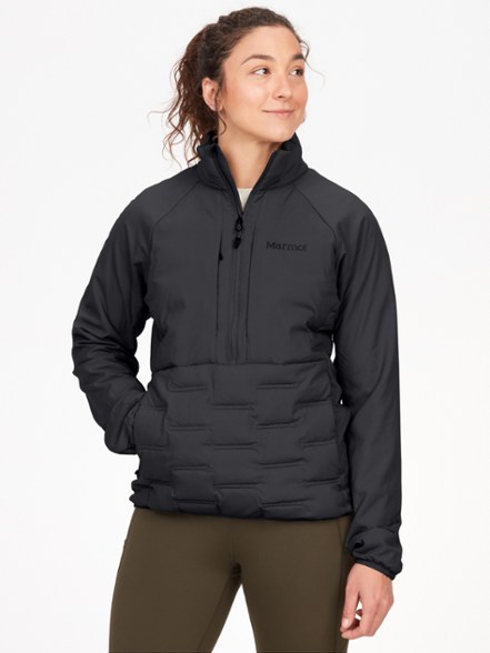 Side view of insulated jacket showing gusseted underarms and zip pocket functionality