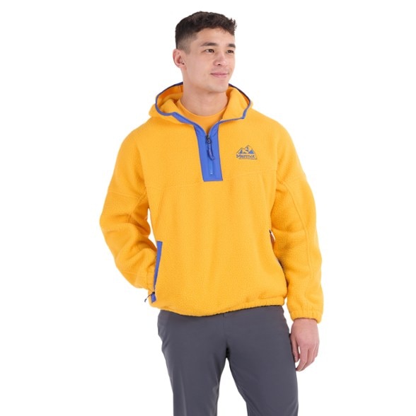Eco-Friendly Super Aros Fleece Hoodie in a relaxed outdoor setting