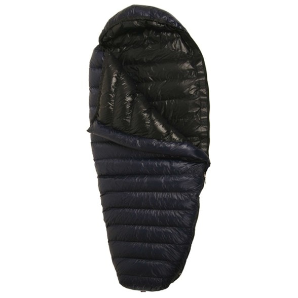 TerraLite 25 sleeping bag displayed in a camping setting, emphasizing its lightweight and spacious design.