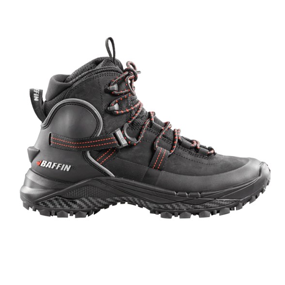 Side view of Elora women's hiking boots on snowy terrain, highlighting the ice grip soles.