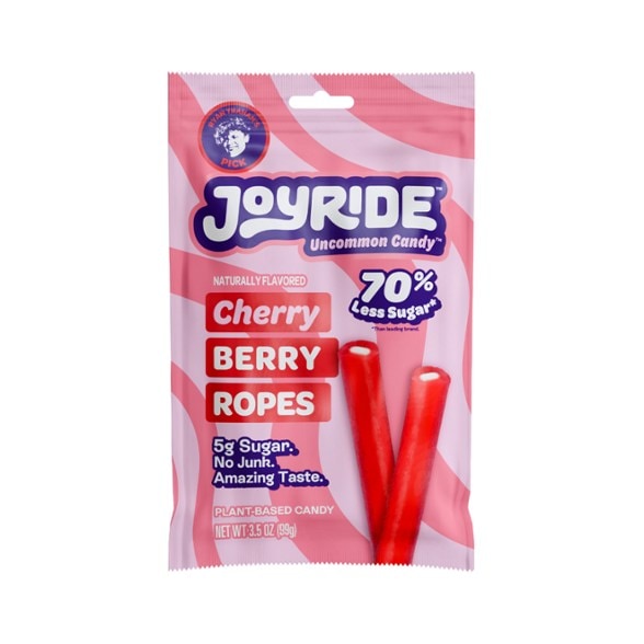 Close-up of Joyride Vegan Berry Twists on a wooden table, showcasing their vibrant colors.