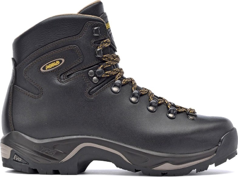 Asolo Men's TPS 535 hiking boots featuring a waterproof design and rugged outsoles on a hiking trail.