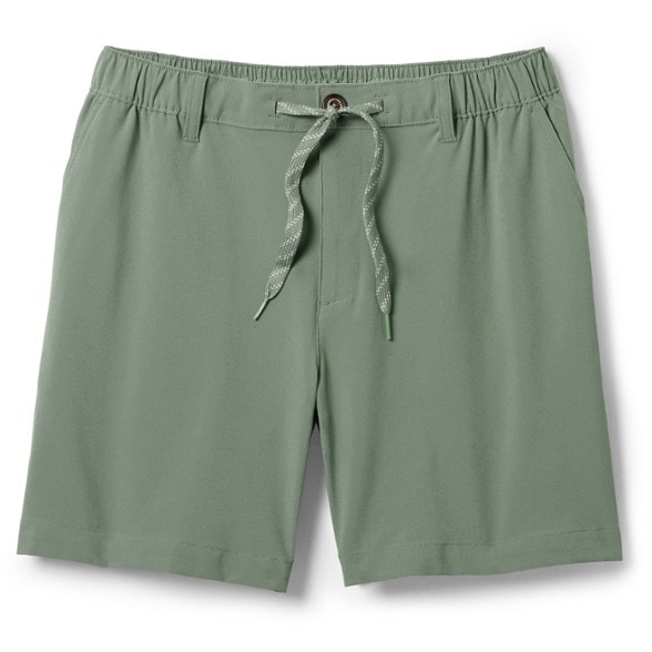 Front view of men's water-resistant shorts with pockets designed for travel and active use