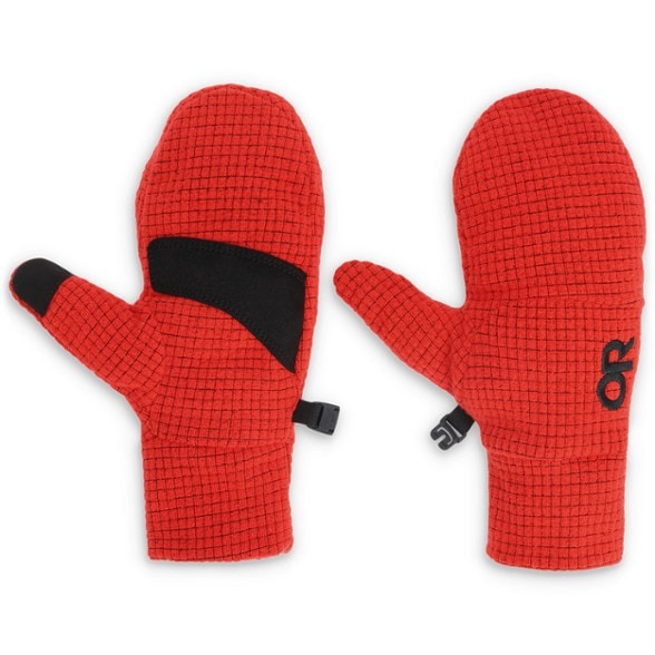 Kids wearing Adventure Ready mittens while playing outside in the snow, showcasing grip and warmth.