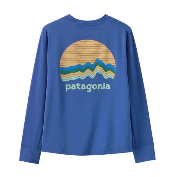 Kids wearing the Ultimate Performance Long Sleeve T-Shirt while hiking, showcasing its flexibility and fit.