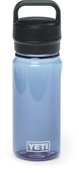Yonder ChugCap water bottle in a hiking setting, showcasing its lightweight design.