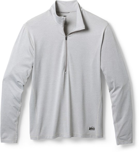 Men's lightweight half-zip top showcasing underarm gussets and zipper detail.