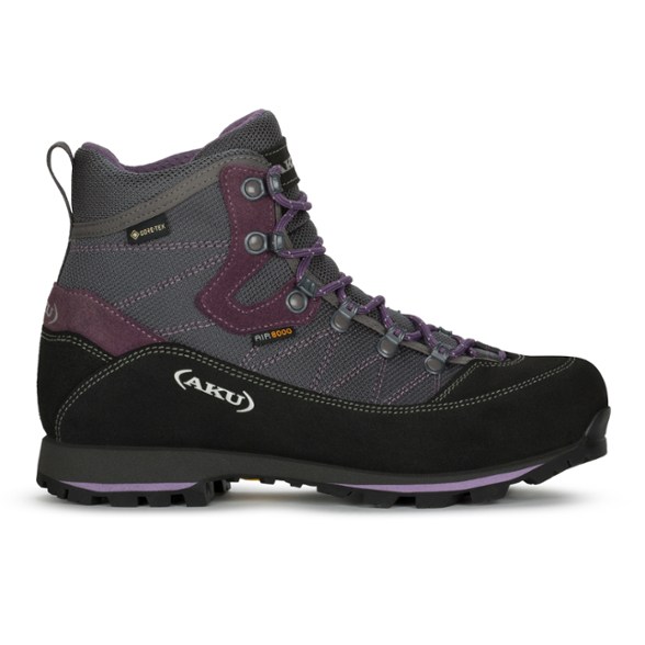 Side view of women's hiking boots with waterproof GORE-TEX membrane on rocky trail