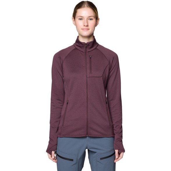 Trailblazer Women's Fleece Jacket in action on a hiking trail, showing its lightweight design and warm fleece interior.