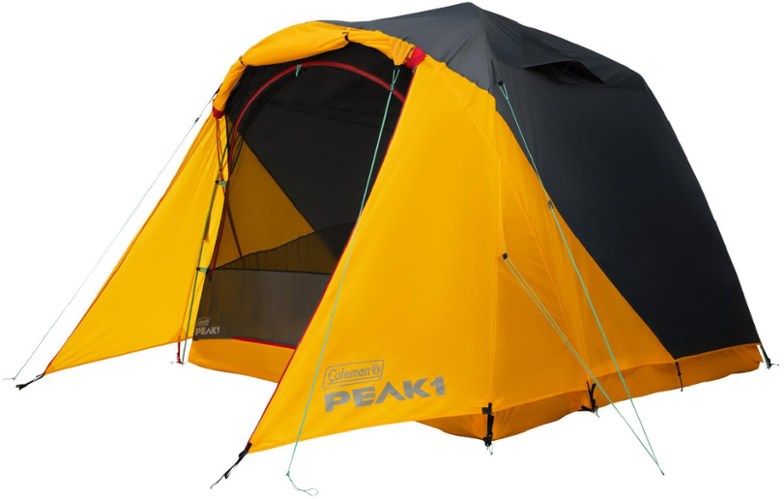 Front view of the PEAK1 Adventure 4-Person Dome Tent set up in the forest.
