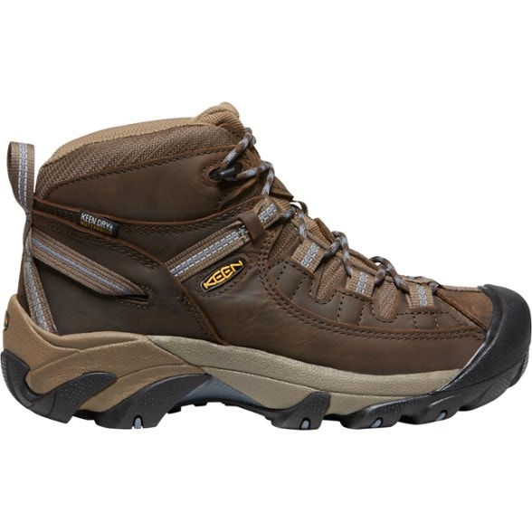 Side view of KEEN Women's Targhee II Mid Waterproof Hiking Boots highlighting the leather upper and lacing system.