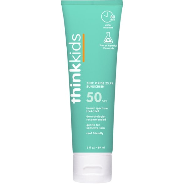 Thinksport kids sunscreen SPF 50 applied during beach fun