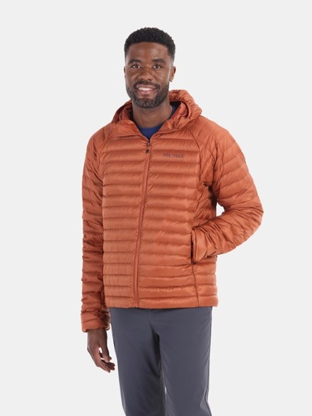Front view of the men's down jacket showcasing its sleek design and water-resistant fabric