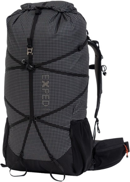 Exped Lightning 45 Women's Backpack displayed in a mountainscape, showcasing its lightweight design and water-repellent features.